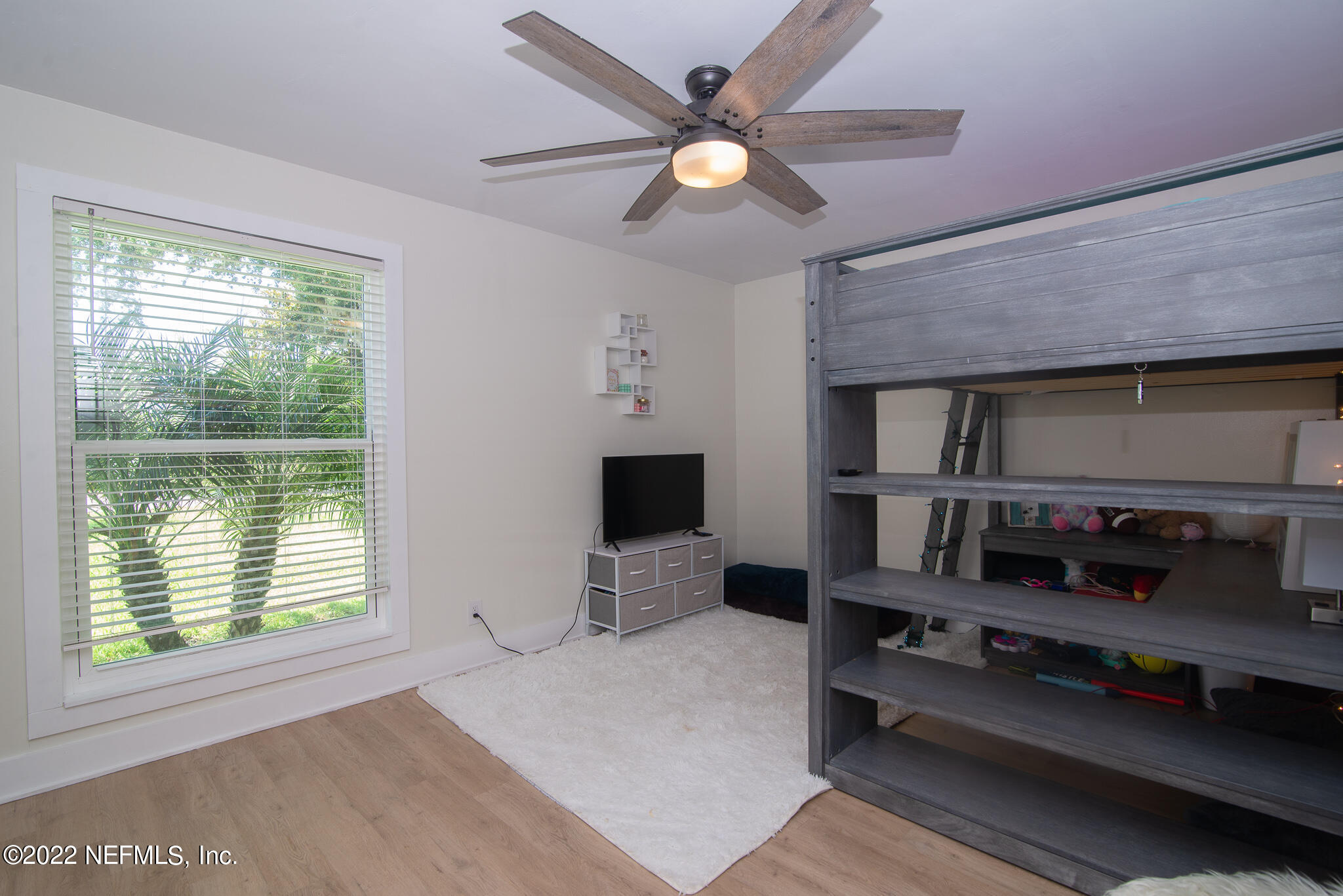 4268 Heath Road Jacksonville, FL 32277 - Photo 27 of 43 a bedroom with furniture and a window
