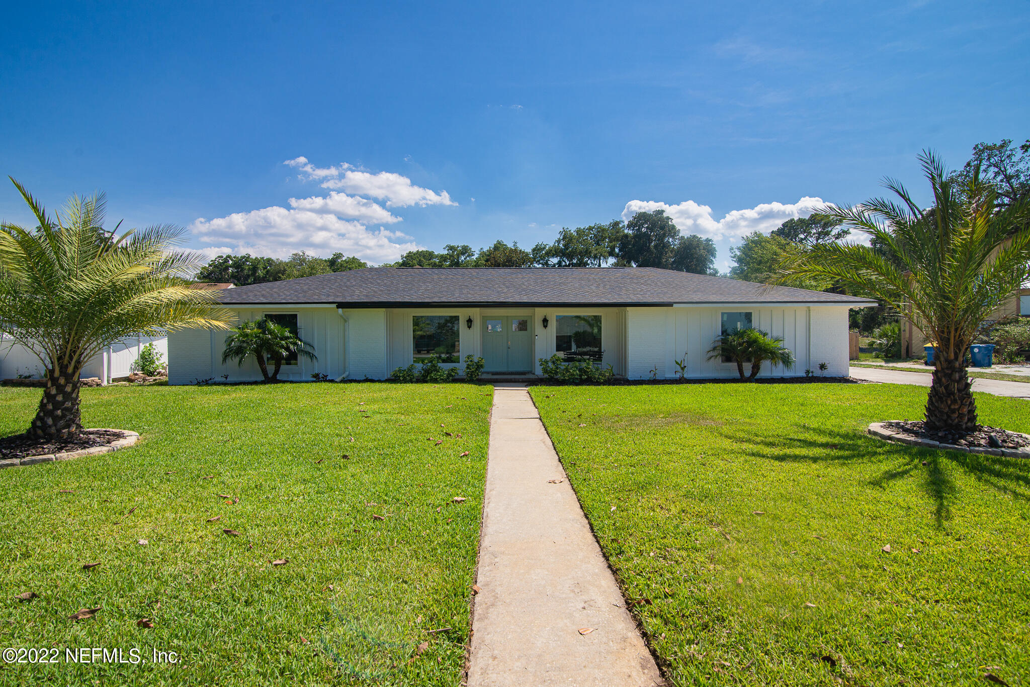 4268 Heath Road Jacksonville, FL 32277 - Photo 3 of 43 a front view of house with yard and green space