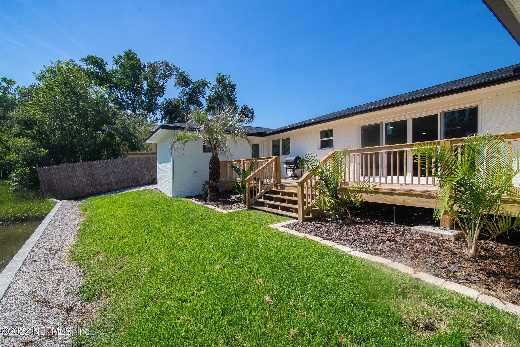 4268 Heath Road Jacksonville, FL 32277 - Photo 8 of 43 a view of a house with backyard and sitting area