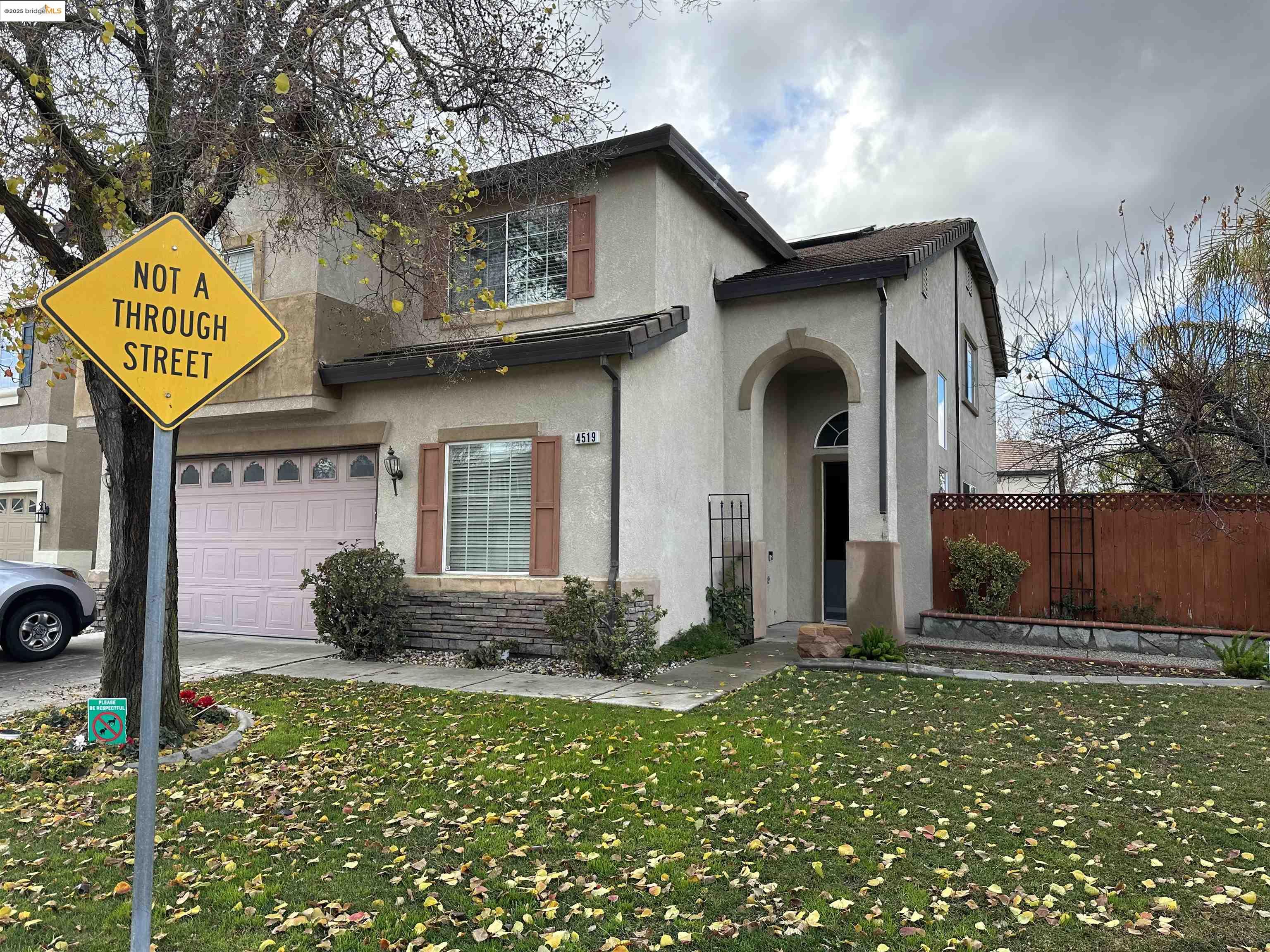 4519 Twin Creeks Court Tracy, CA 95377 - Photo 1 of 34 a front view of a house with garden