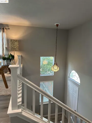 a view of entryway with wooden floor