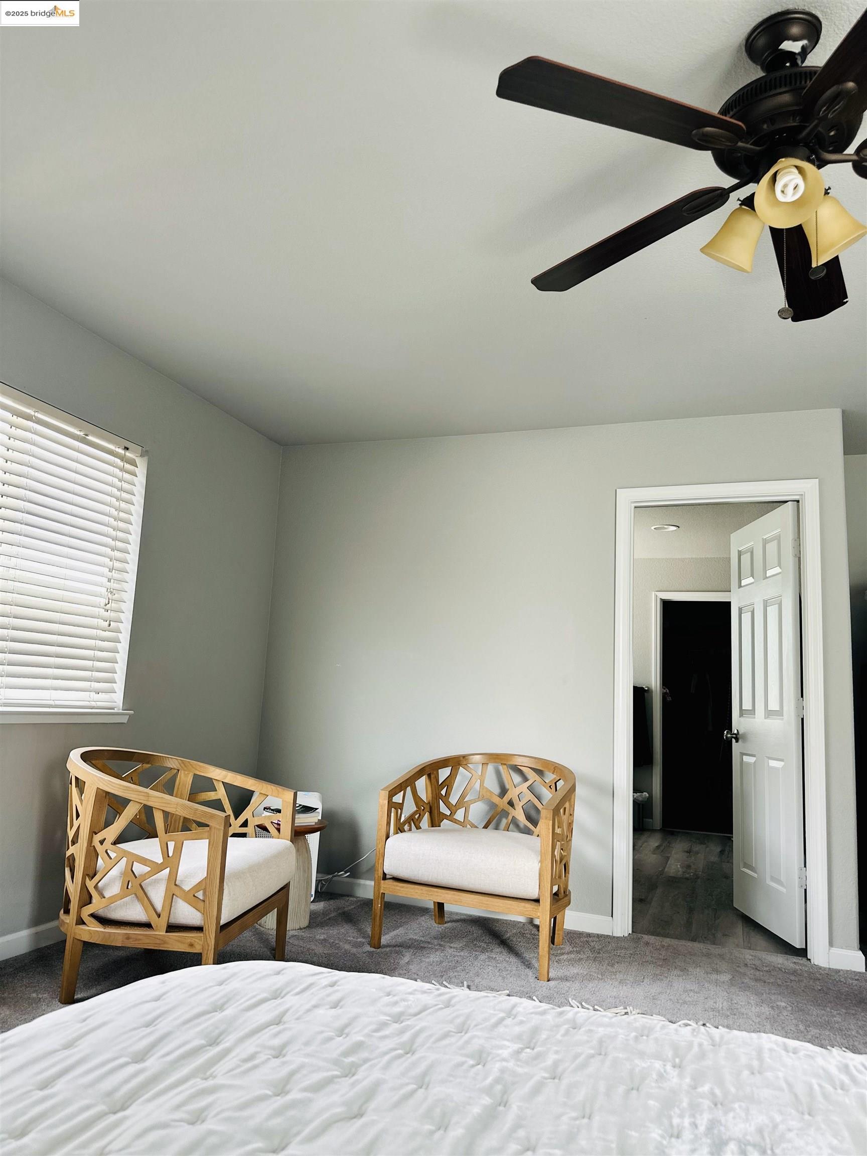 4519 Twin Creeks Court Tracy, CA 95377 - Photo 23 of 34 a bedroom with a bed and a fireplace