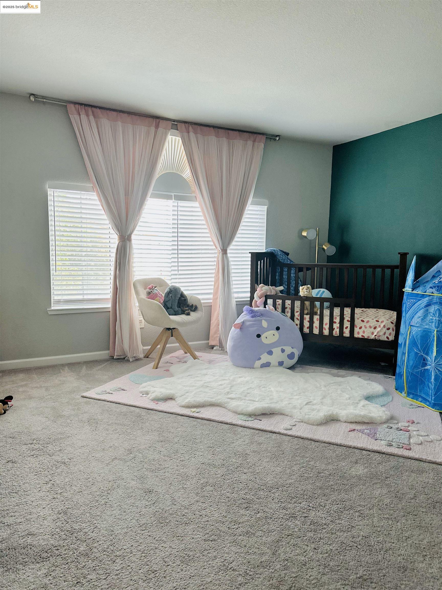 4519 Twin Creeks Court Tracy, CA 95377 - Photo 25 of 34 a bedroom with furniture and a large window