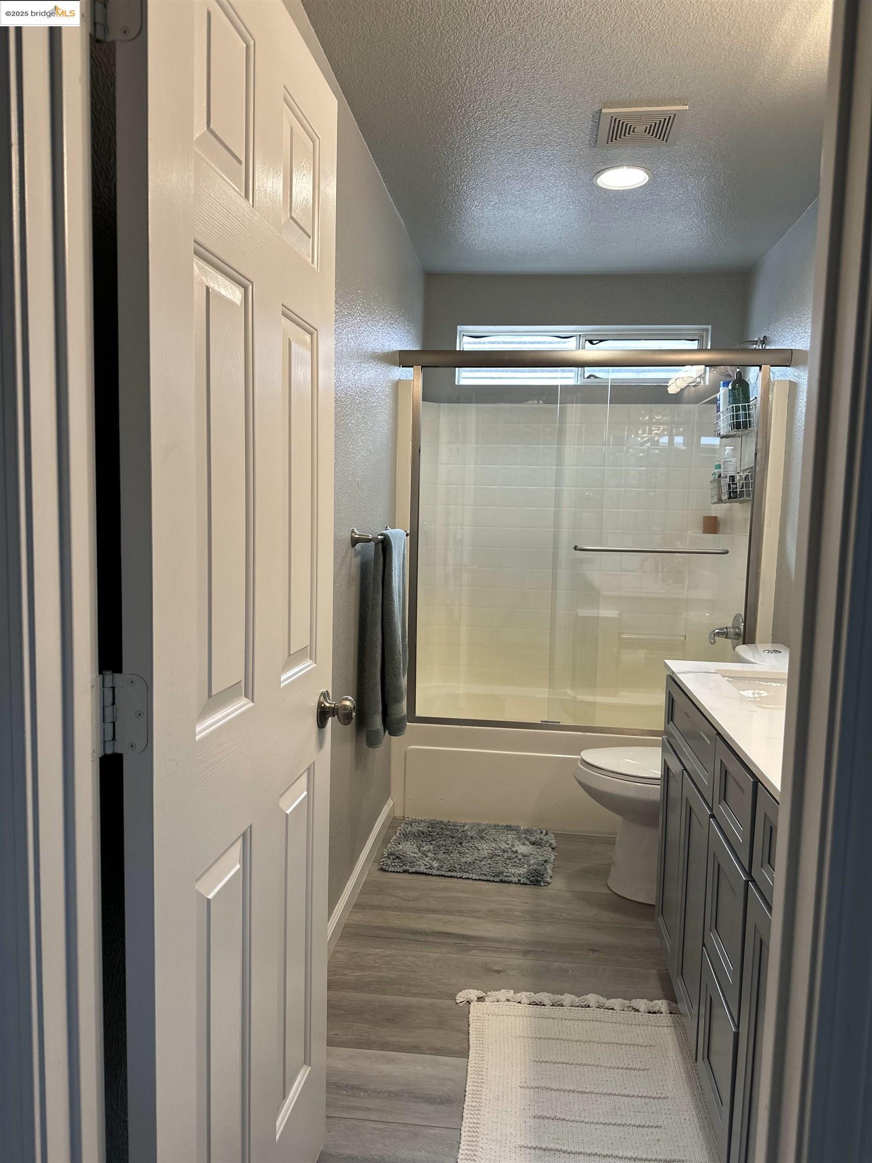 4519 Twin Creeks Court Tracy, CA 95377 - Photo 27 of 34 a bathroom with a shower and a toilet