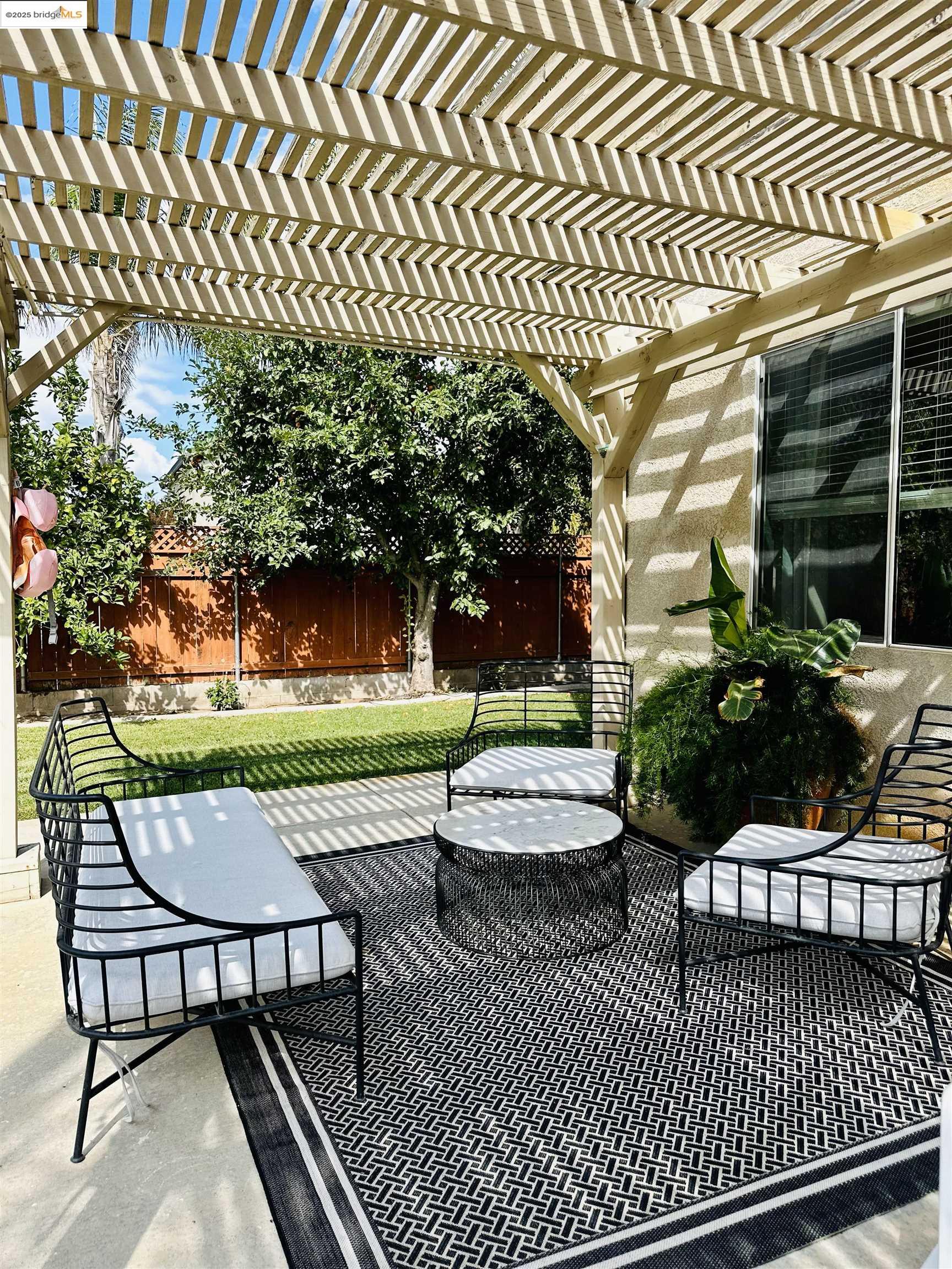 4519 Twin Creeks Court Tracy, CA 95377 - Photo 28 of 34 a view of a patio with a bench