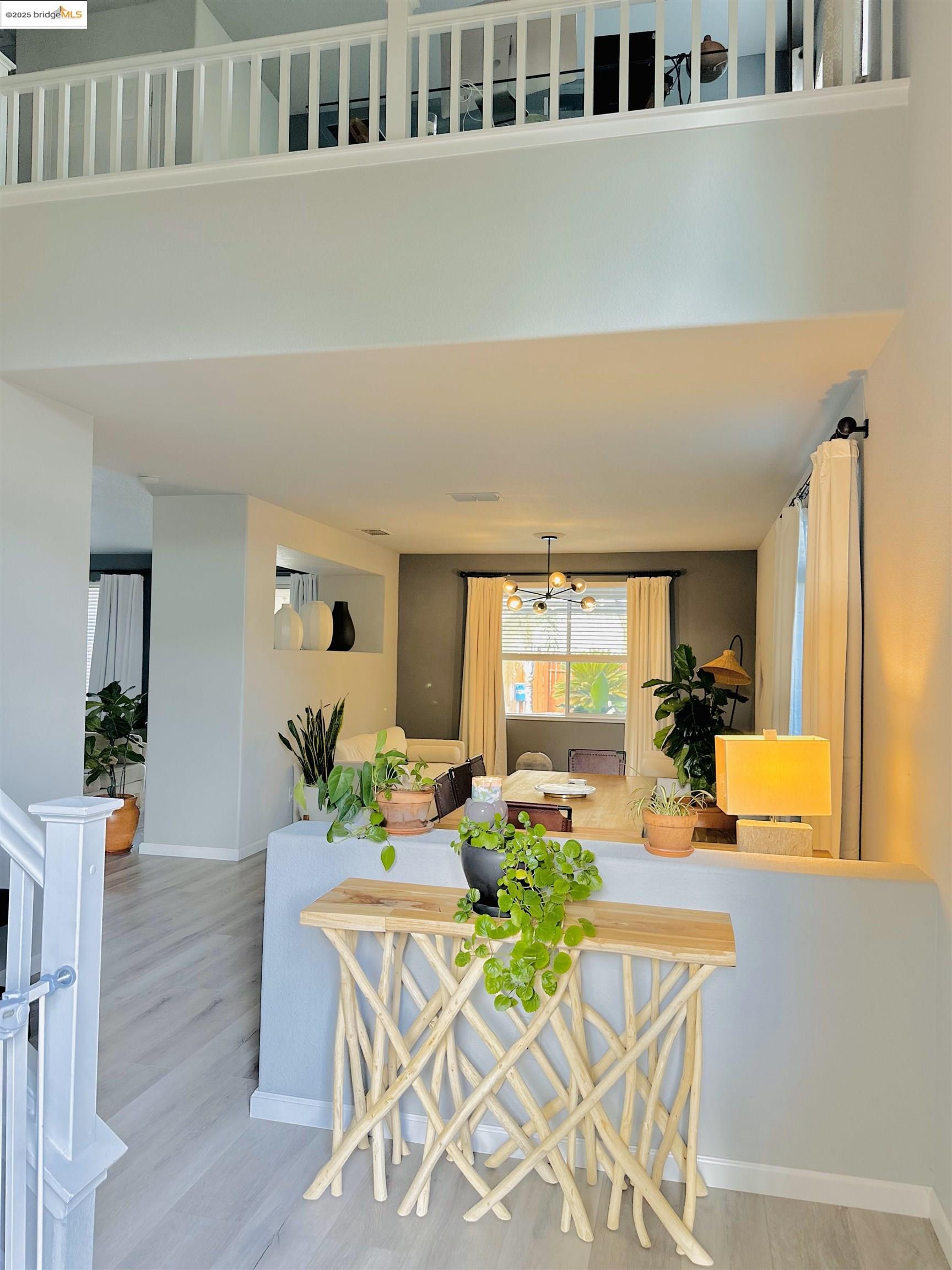 4519 Twin Creeks Court Tracy, CA 95377 - Photo 6 of 34 a living room with furniture windows and wooden floor