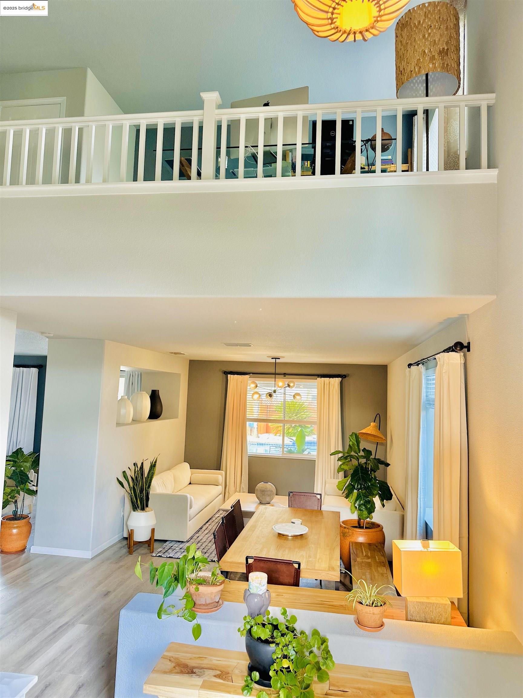4519 Twin Creeks Court Tracy, CA 95377 - Photo 10 of 34 a living room with furniture windows and wooden floor