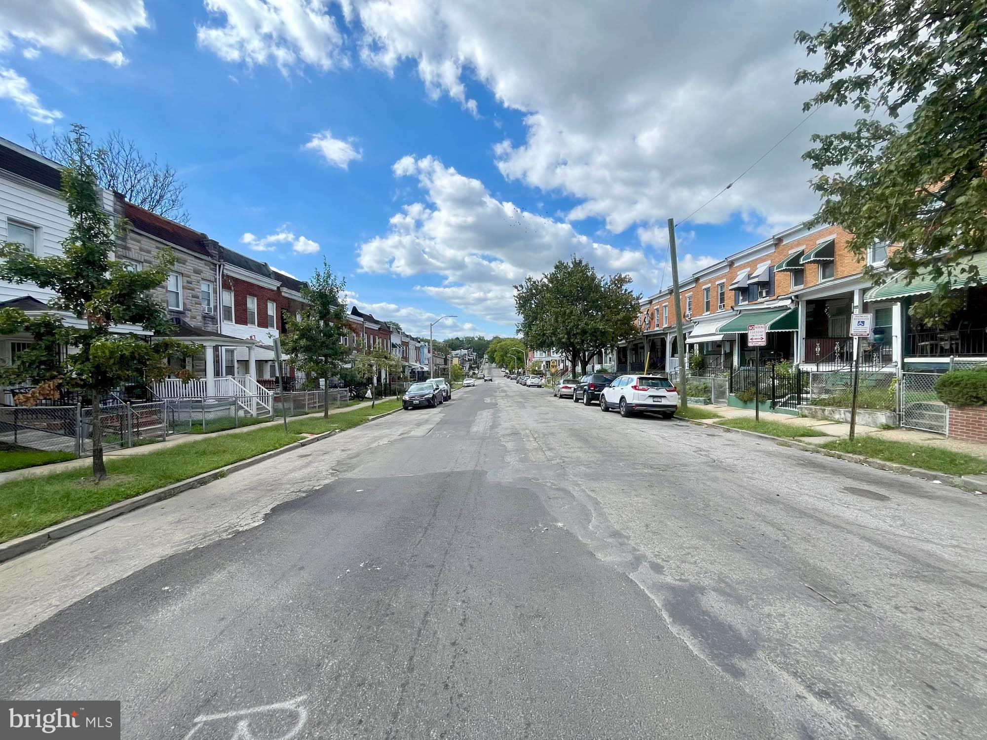 2701 Baker Street Baltimore, MD 21216 - Photo 15 of 16 a view of street with houses