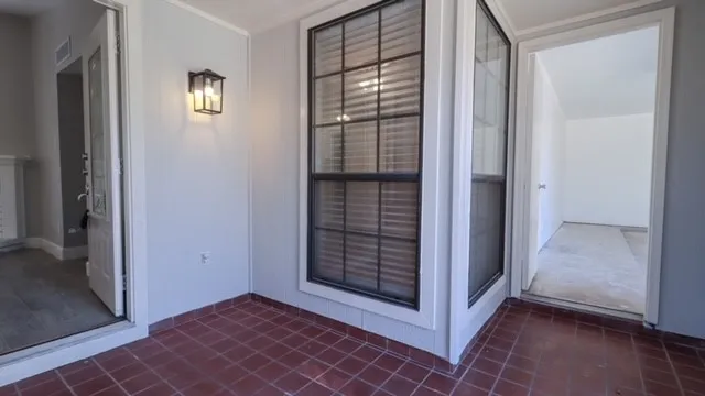 an empty room with windows