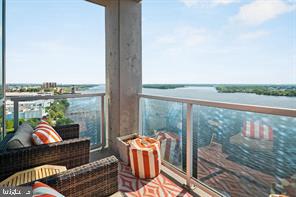 901 North Penn Street, Unit R1501 Philadelphia, PA 19123 - Photo 12 of 25 a living room filled with furniture and a floor to ceiling window