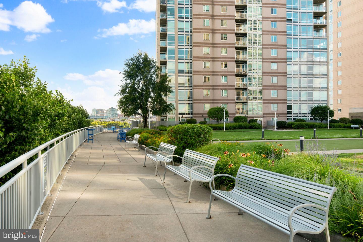 901 North Penn Street, Unit R1501 Philadelphia, PA 19123 - Photo 19 of 25 a view of a chairs and tables in the backyard