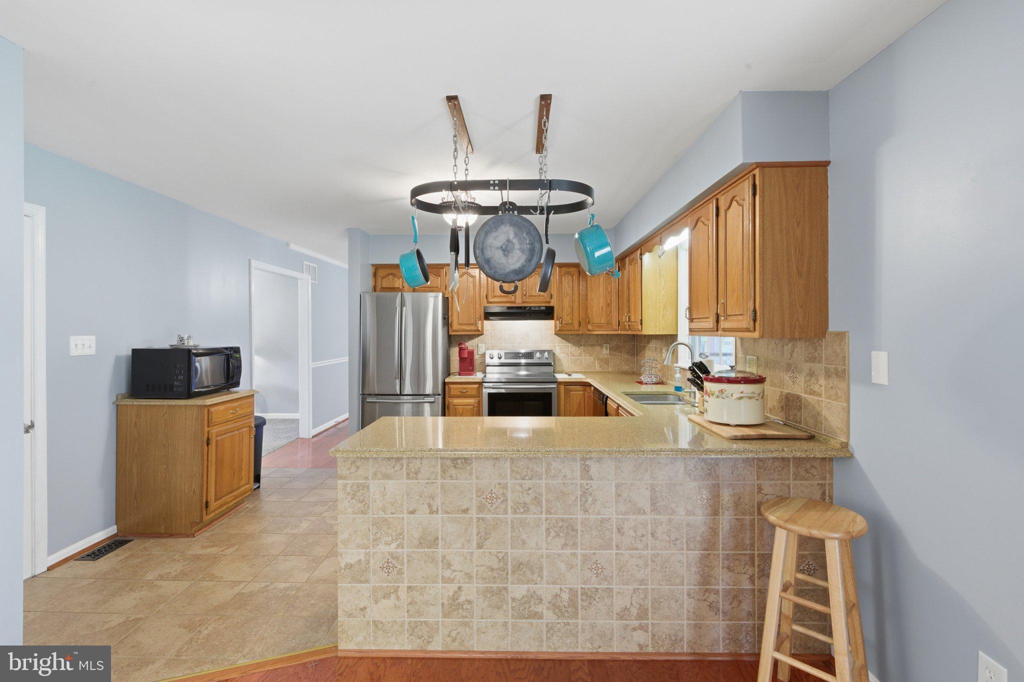 18310 Upper Beckleysville Road Hampstead, MD 21074 - Photo 21 of 67 Charming kitchen with modern flair.