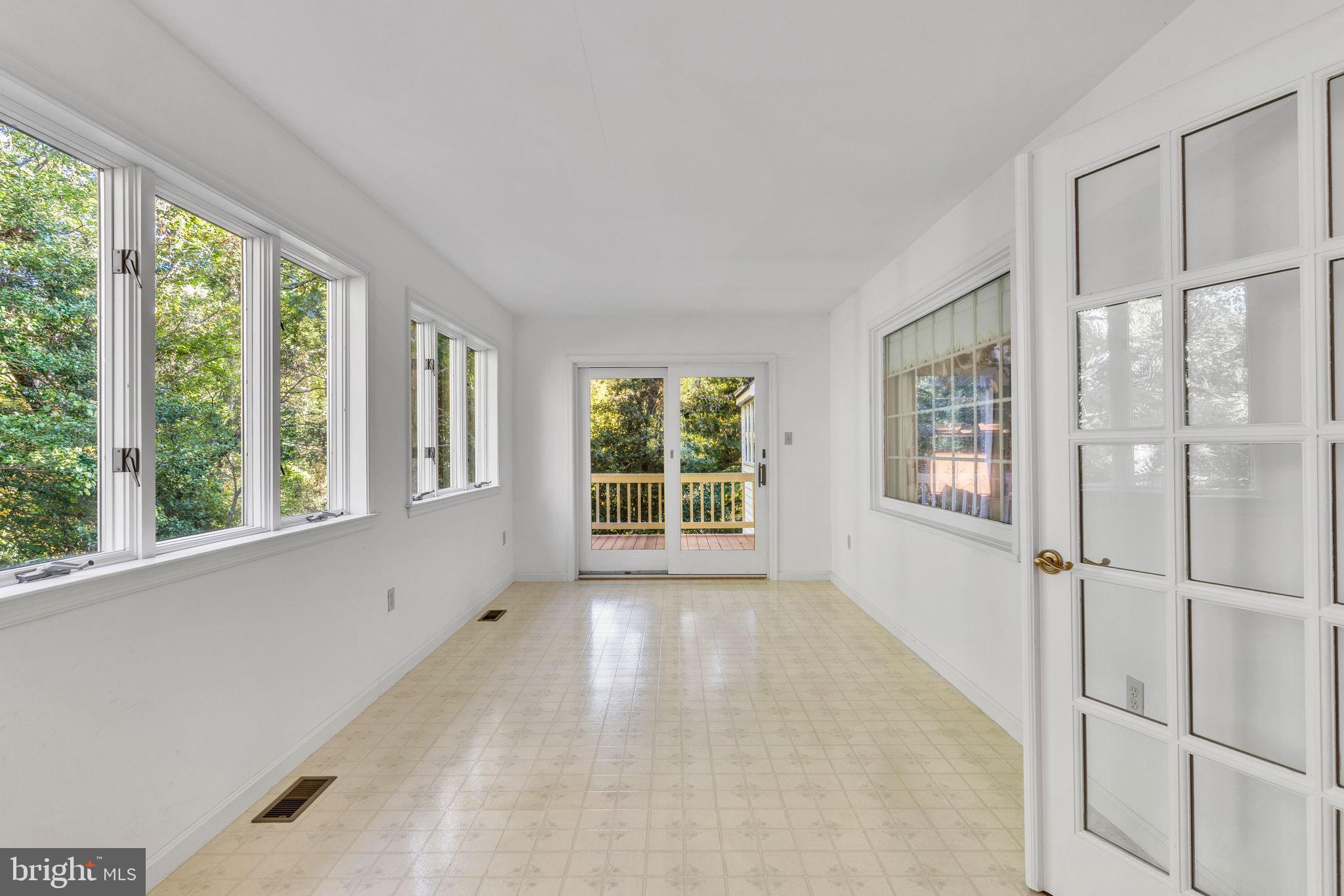 11160 Cove Lake Road Lusby, MD 20657 - Photo 8 of 29 Sunroom for picturesque views
