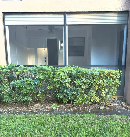 a view of a backyard of the house