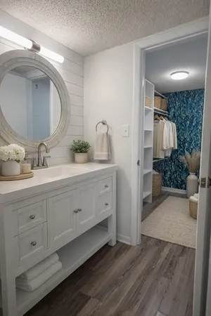 a spacious bathroom with a double vanity sink and a mirror
