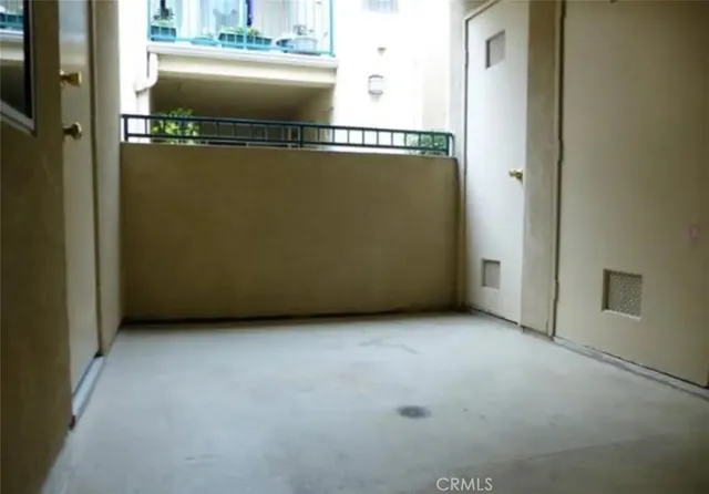 a view of a room that has a large window