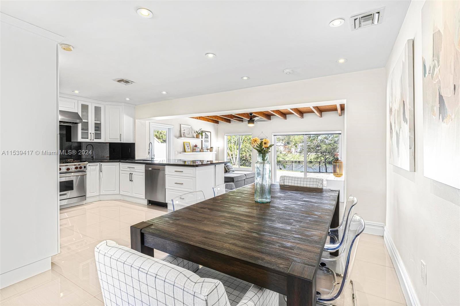1301 Southwest 99th Court Miami, FL 33174 - Photo 11 of 35 a living room with stainless steel appliances furniture kitchen view and a large window
