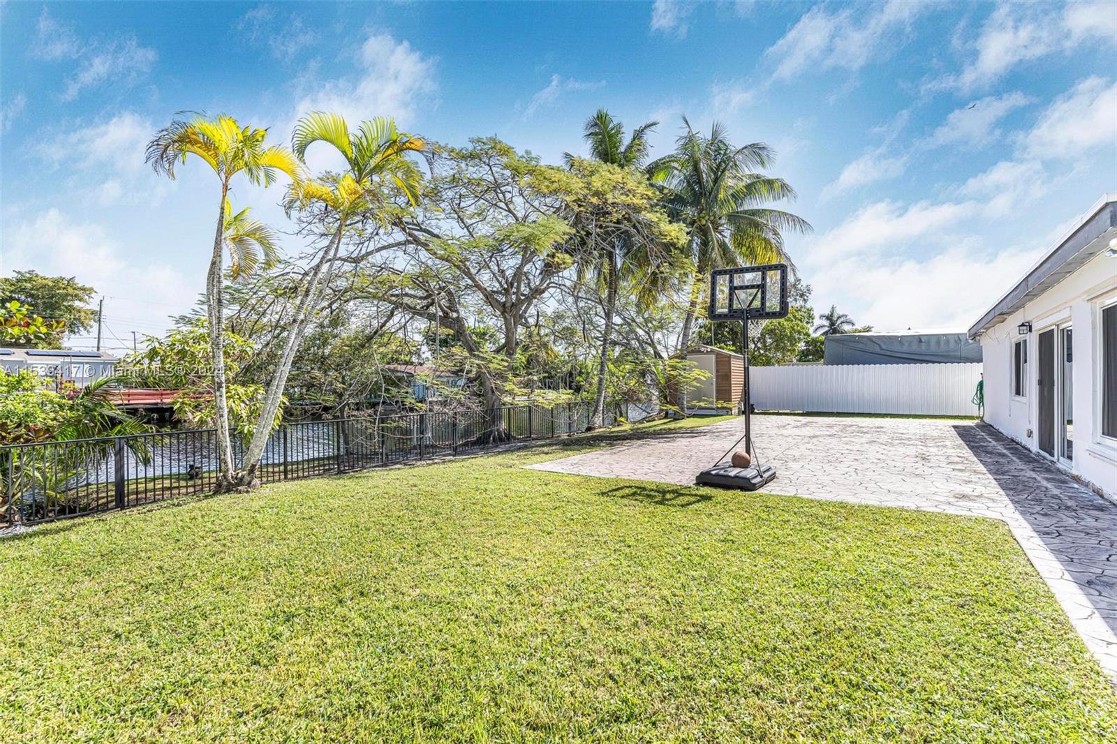 1301 Southwest 99th Court Miami, FL 33174 - Photo 25 of 35 a swimming pool with plants