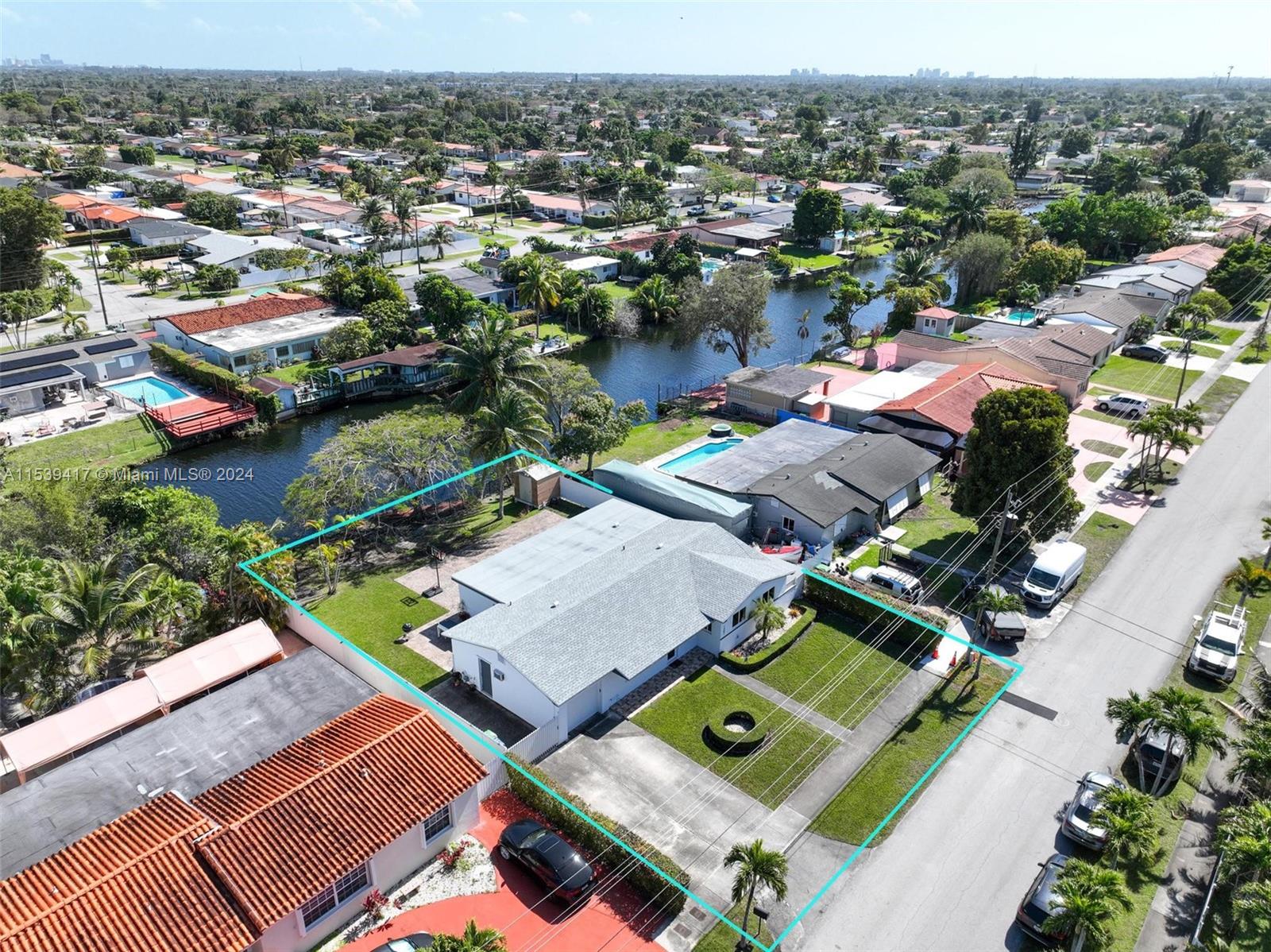 1301 Southwest 99th Court Miami, FL 33174 - Photo 32 of 35 an aerial view of a house with a garden