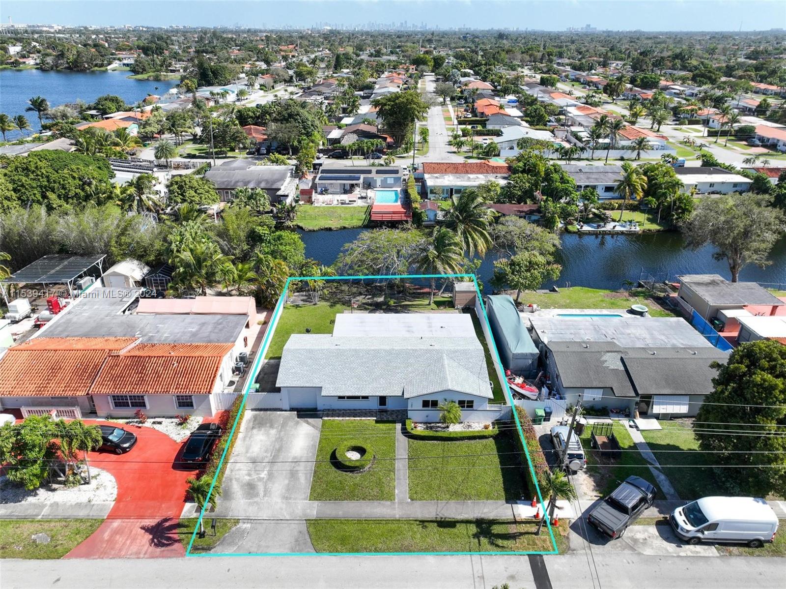 1301 Southwest 99th Court Miami, FL 33174 - Photo 34 of 35 an aerial view of residential houses with outdoor space