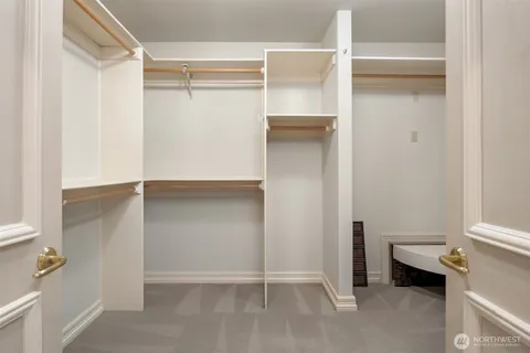 a view of an empty walk in closet