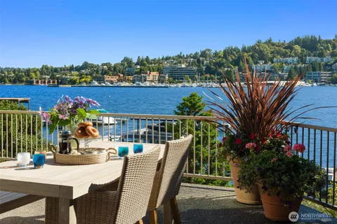 a view of a chairs and table in patio