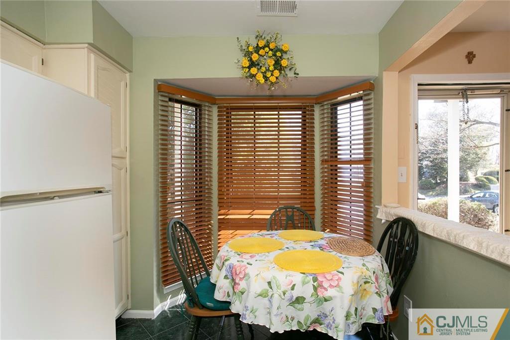 1206 Maplecrest Road Edison, NJ 08820 - Photo 10 of 15 a bedroom with a bed and a window