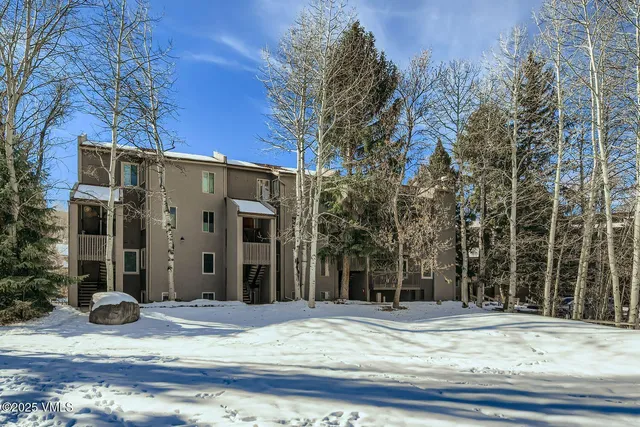 a view of a building on a street