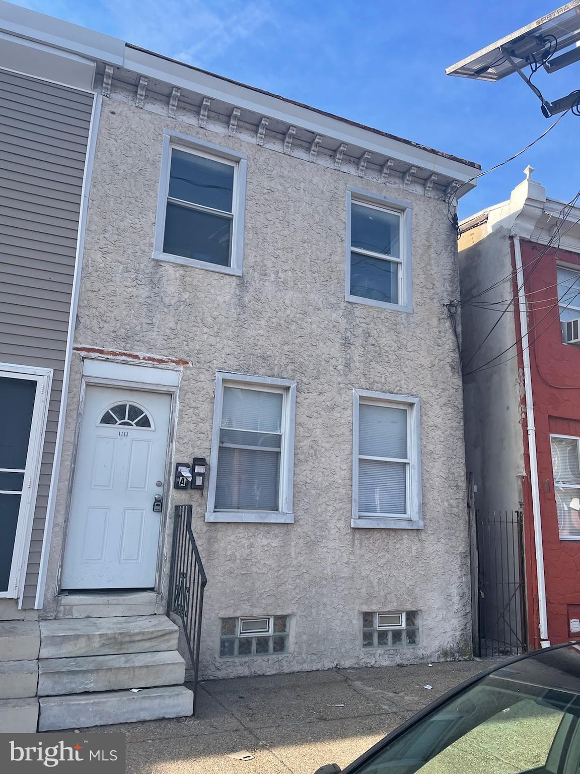 1111 South 4th Street, Unit B Camden, NJ 08103 - Photo 1 of 1 a front view of a house with a yard