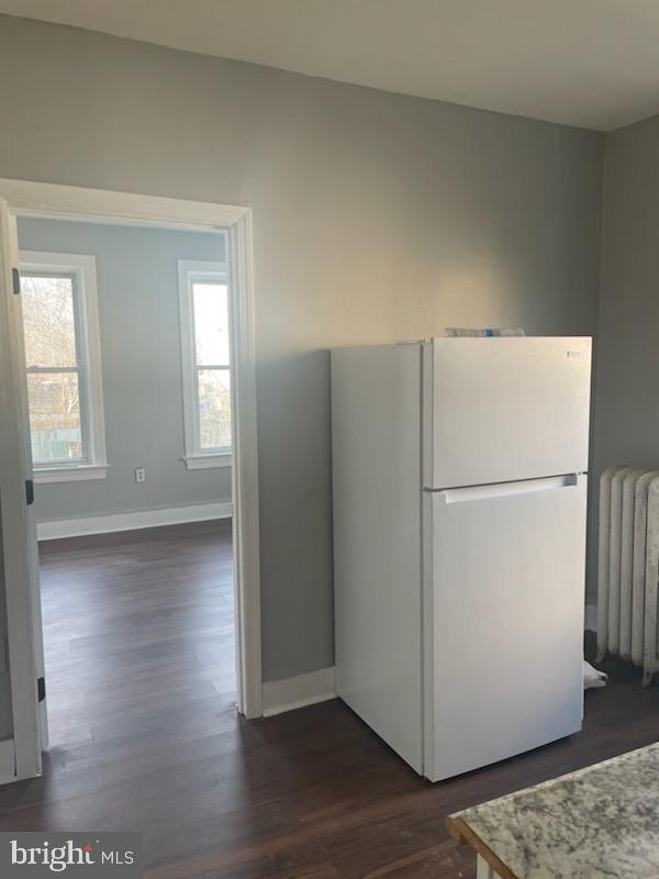 1111 South 4th Street, Unit B Camden, NJ 08103 - Photo 10 of 11 a view of empty room with wooden floor and window