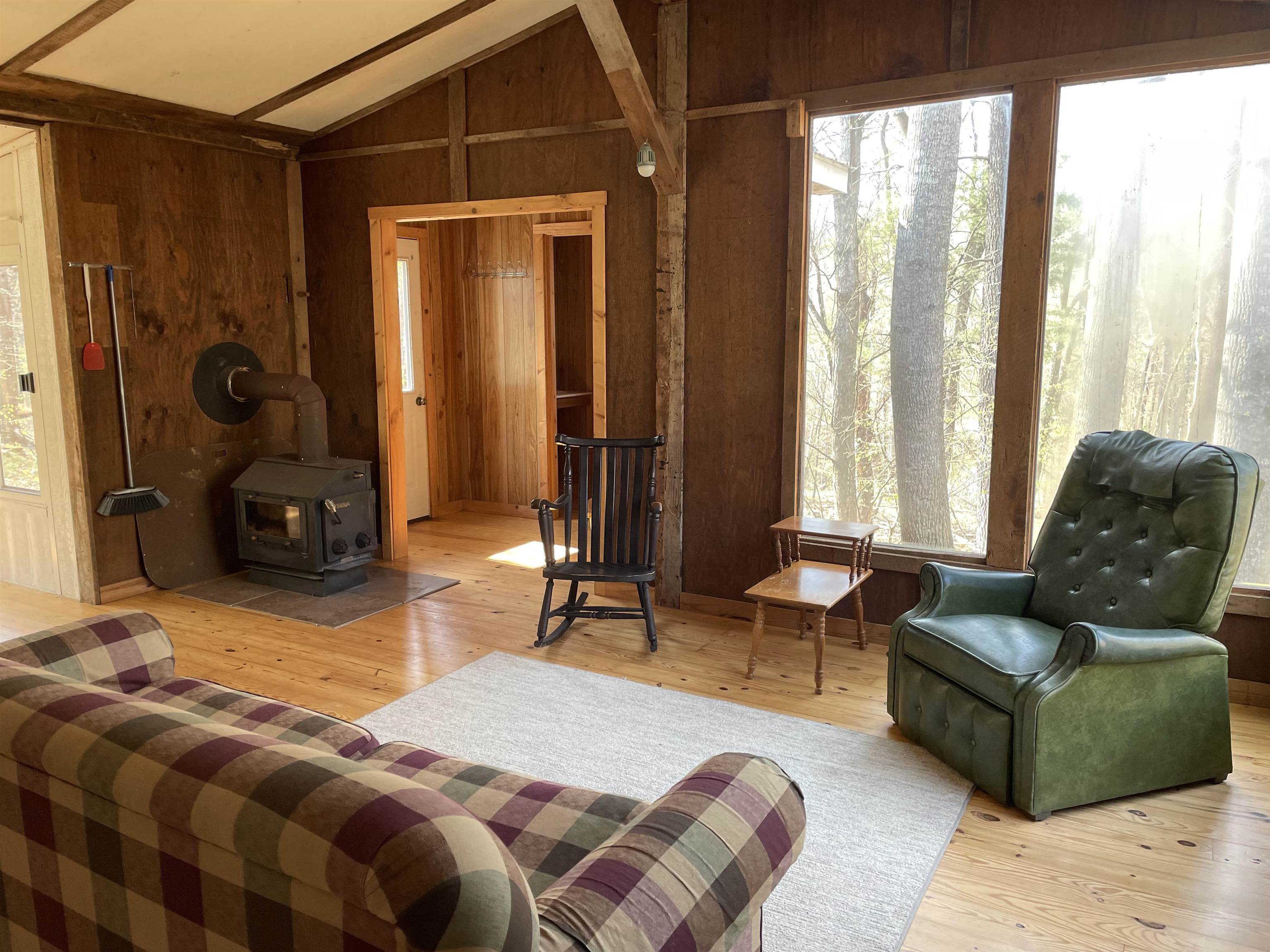 163-acres Hopkins Gap Road Fulks Run, VA 22830 - Photo 13 of 75 a bedroom with a bed and a couch next to a window