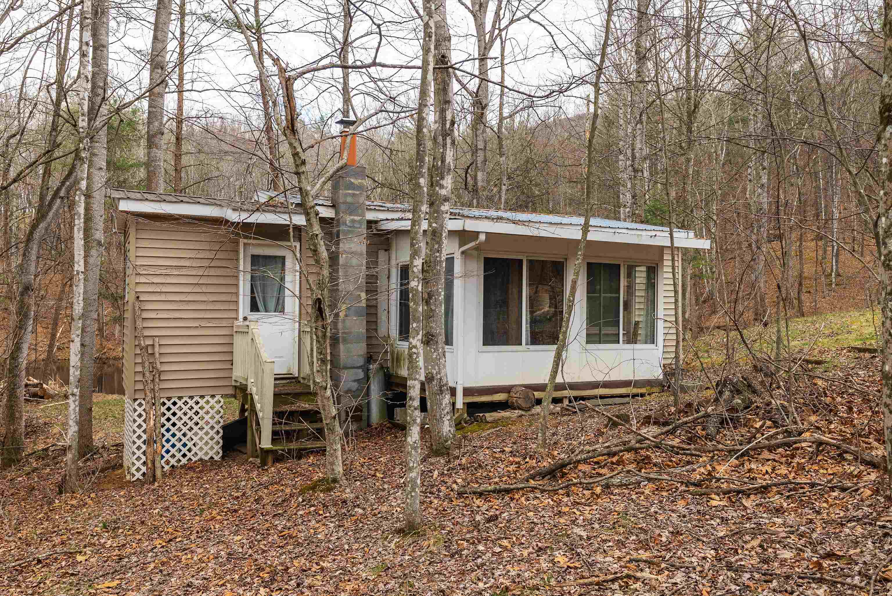 163-acres Hopkins Gap Road Fulks Run, VA 22830 - Photo 6 of 75 a view of a house with a yard and sitting area