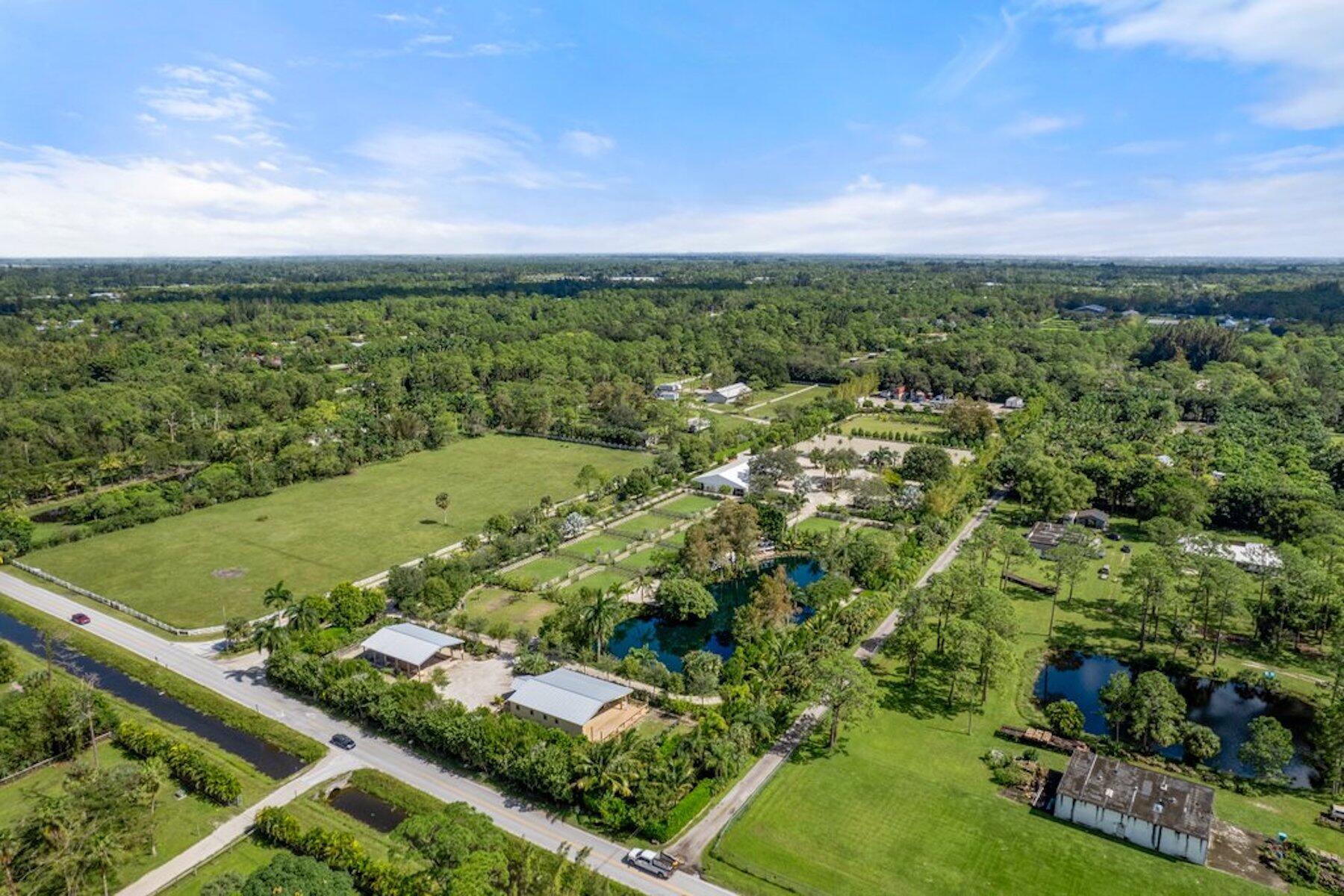 1754 B Road Loxahatchee, FL 33470 - Photo 3 of 32 dji_fly_20241021_123732_943_172953434136