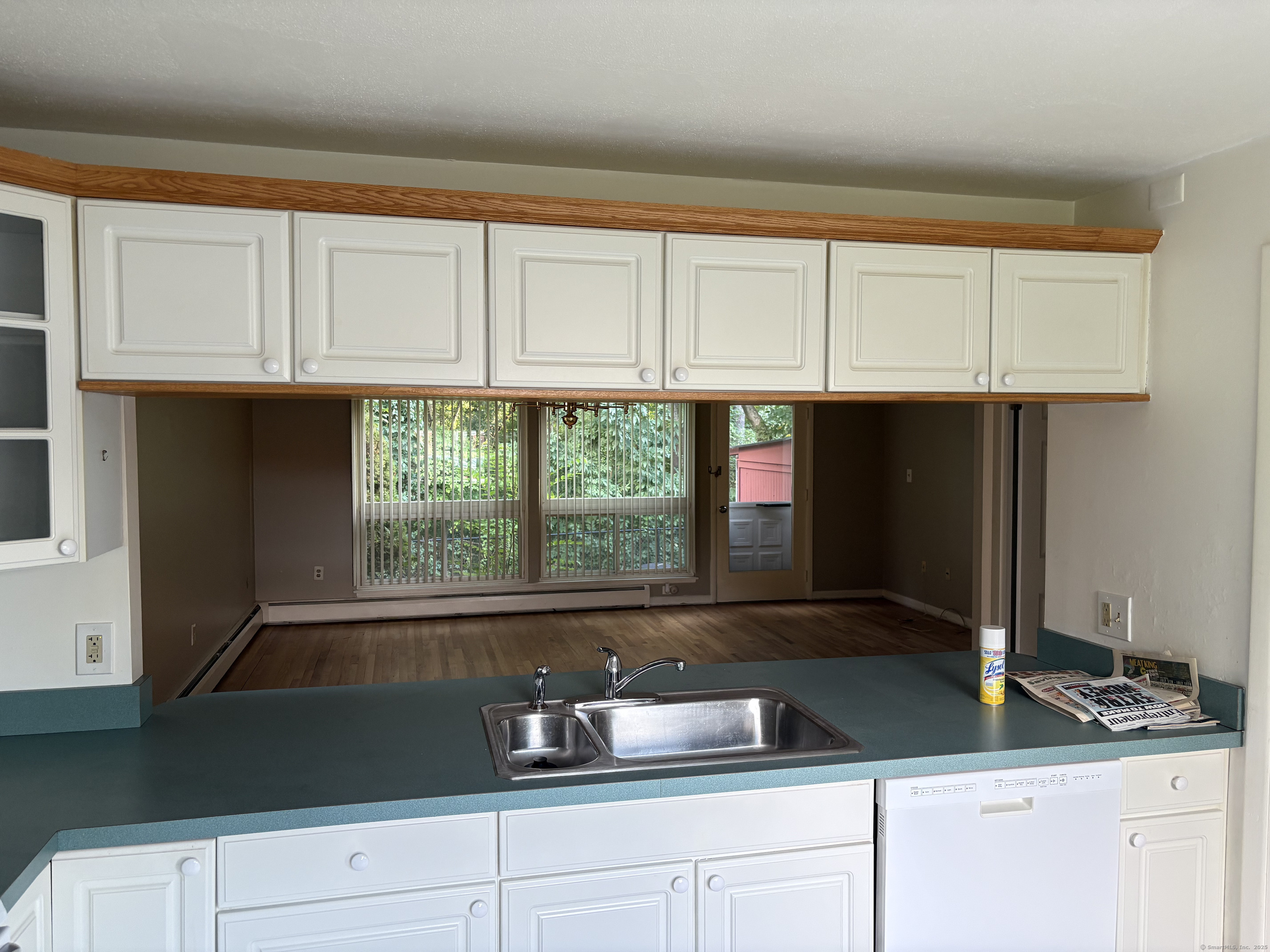 279 Centerbrook Road Hamden, CT 06518 - Photo 3 of 10 a kitchen with granite countertop a sink and a window