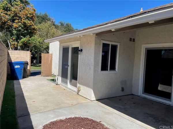 a view of a house with a patio