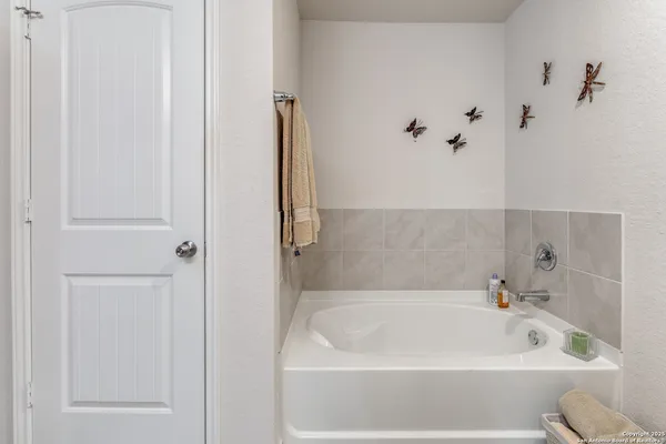 a bathroom with a bathtub