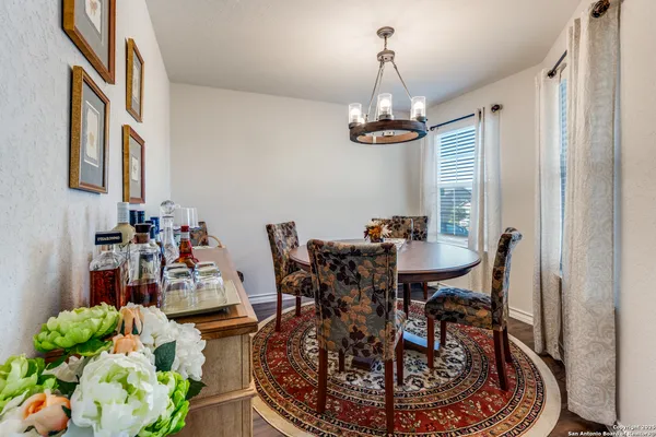 a view of a dining room with furniture