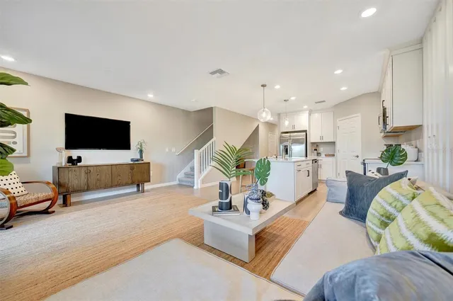 a living room with furniture and window
