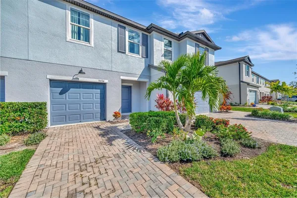 a view of a house with a swimming pool