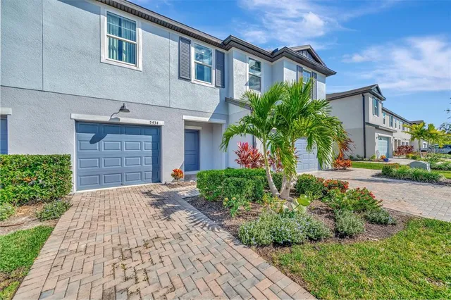 a view of a house with a swimming pool