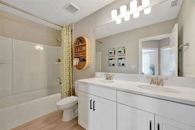 a room with gym equipment and large window