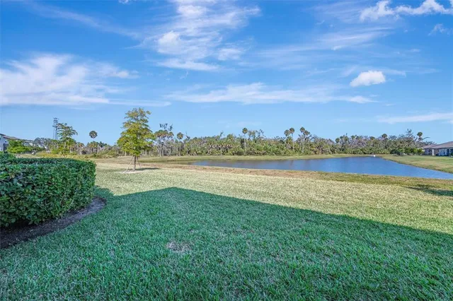 a view of room with window and wooden floor