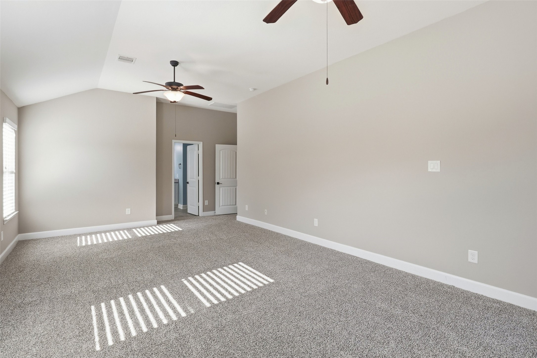 24126 Cane Fields Road Katy, TX 77493 - Photo 28 of 36 A bright and airy primary retreat designed for comfort and relaxation.