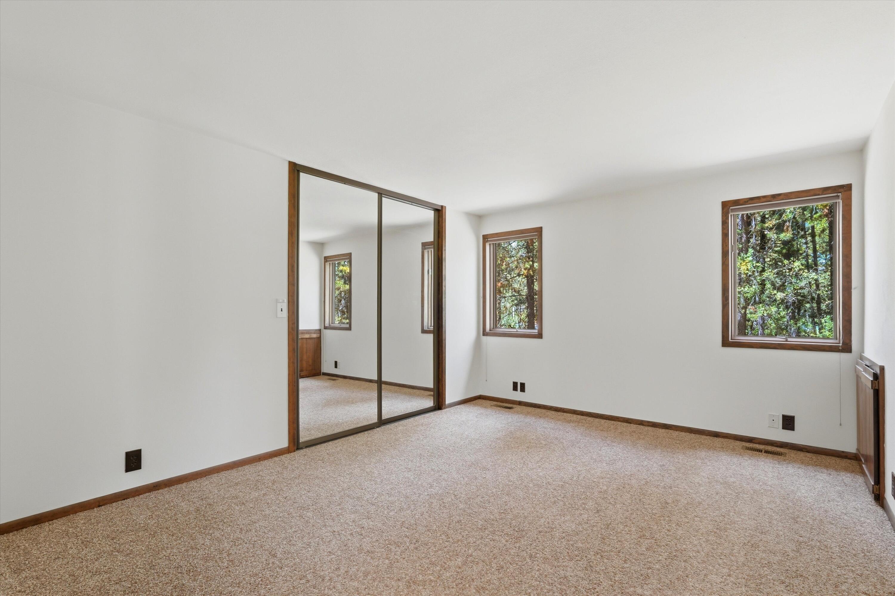 56446 Eclipse Drive Bend, OR 97707 - Photo 24 of 42 an empty room with windows