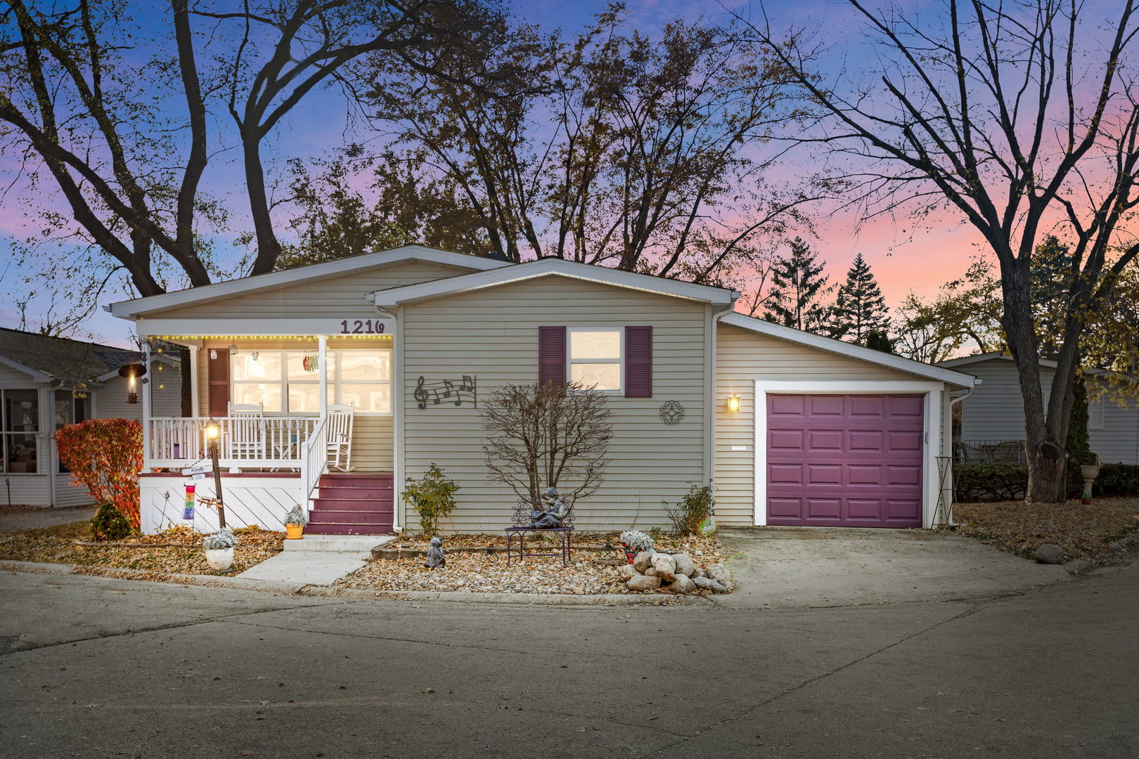 1216 Candlewood Road Elgin, IL 60123 - Photo 1 of 24 a front view of a house with a yard