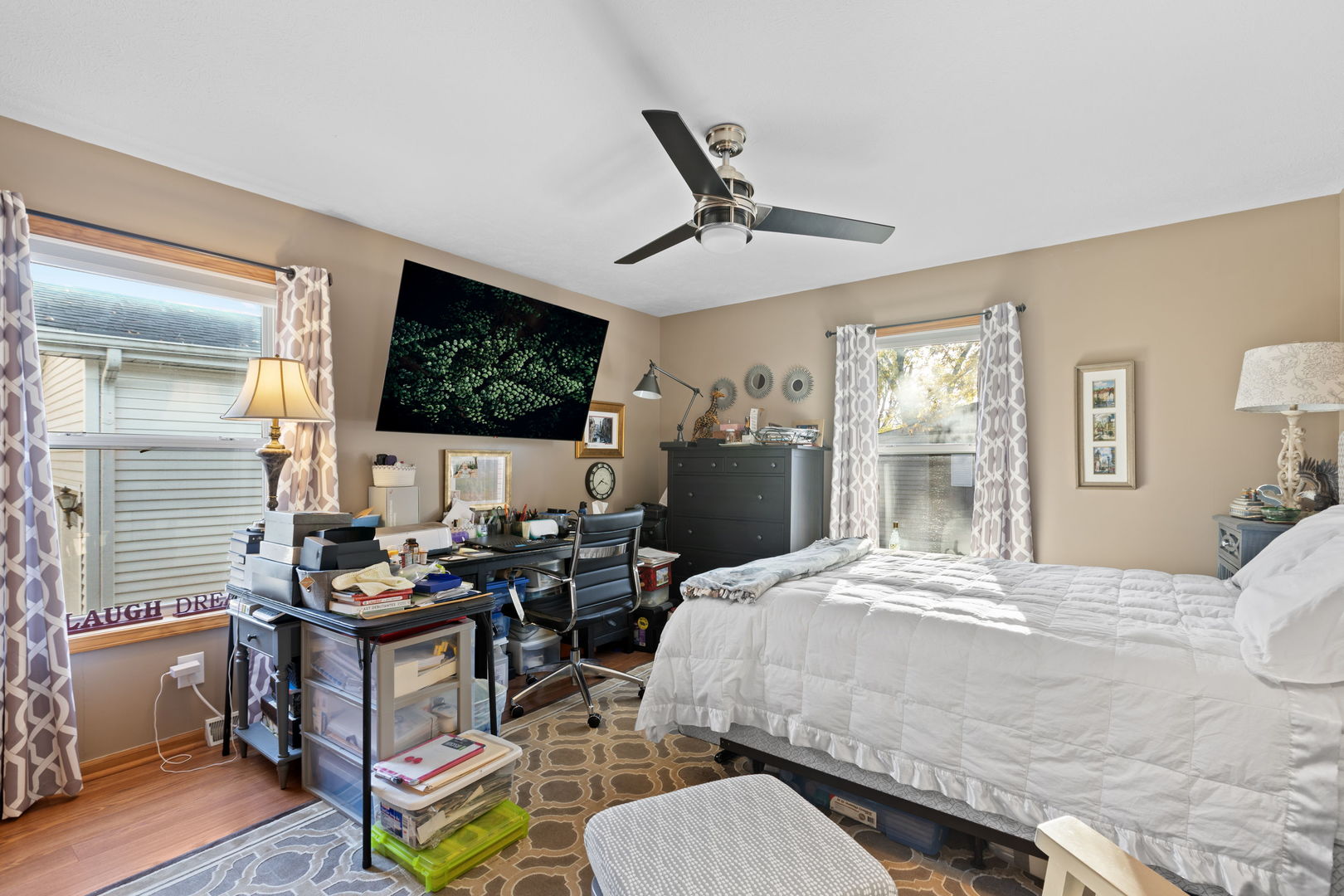 1216 Candlewood Road Elgin, IL 60123 - Photo 19 of 24 a bedroom with a bed and wooden floor