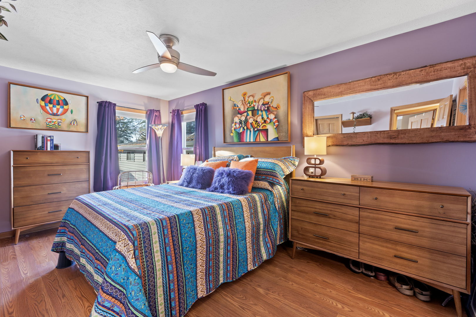 1216 Candlewood Road Elgin, IL 60123 - Photo 20 of 24 a bed room with a bed and a dresser