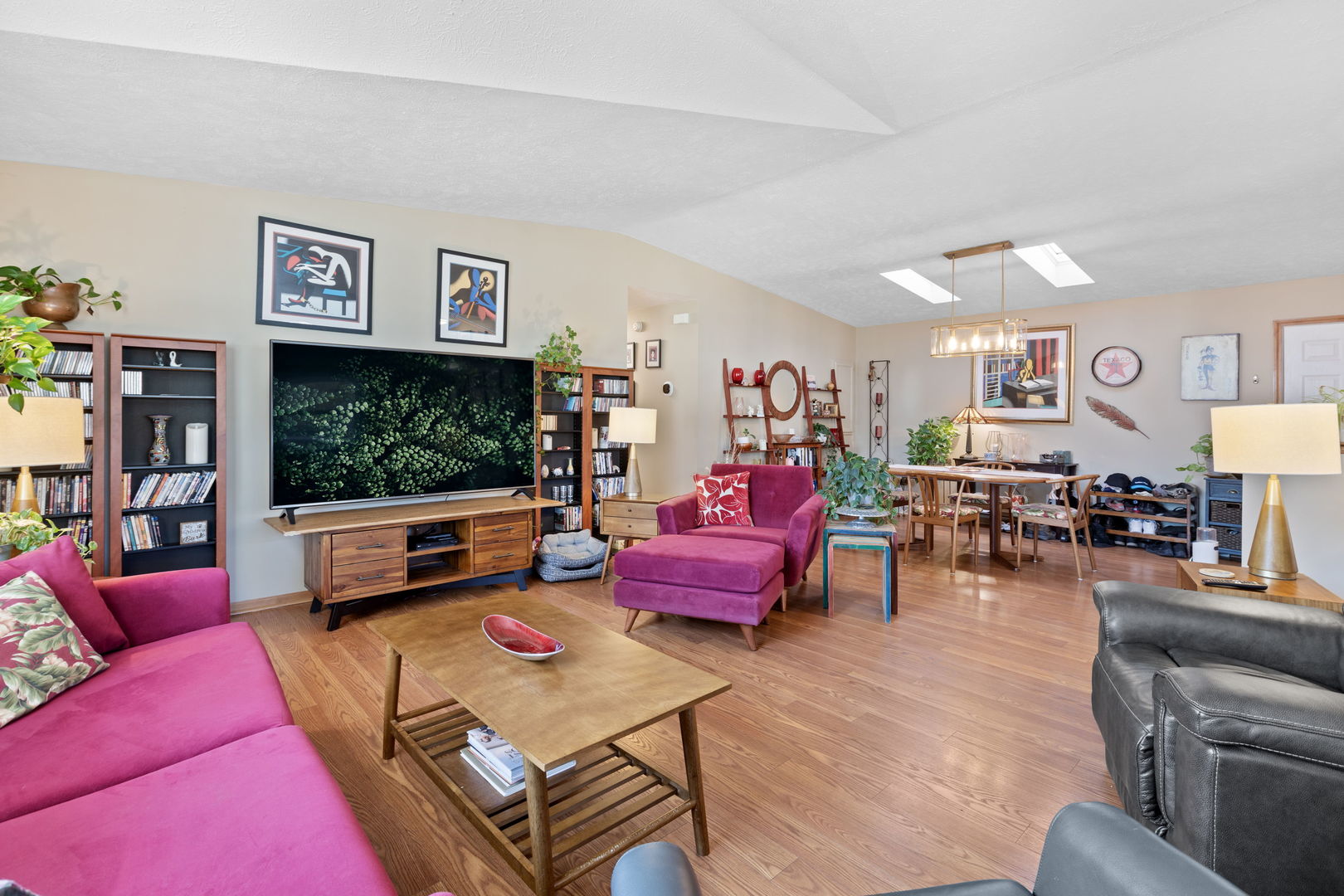 1216 Candlewood Road Elgin, IL 60123 - Photo 6 of 24 a living room with furniture and a flat screen tv