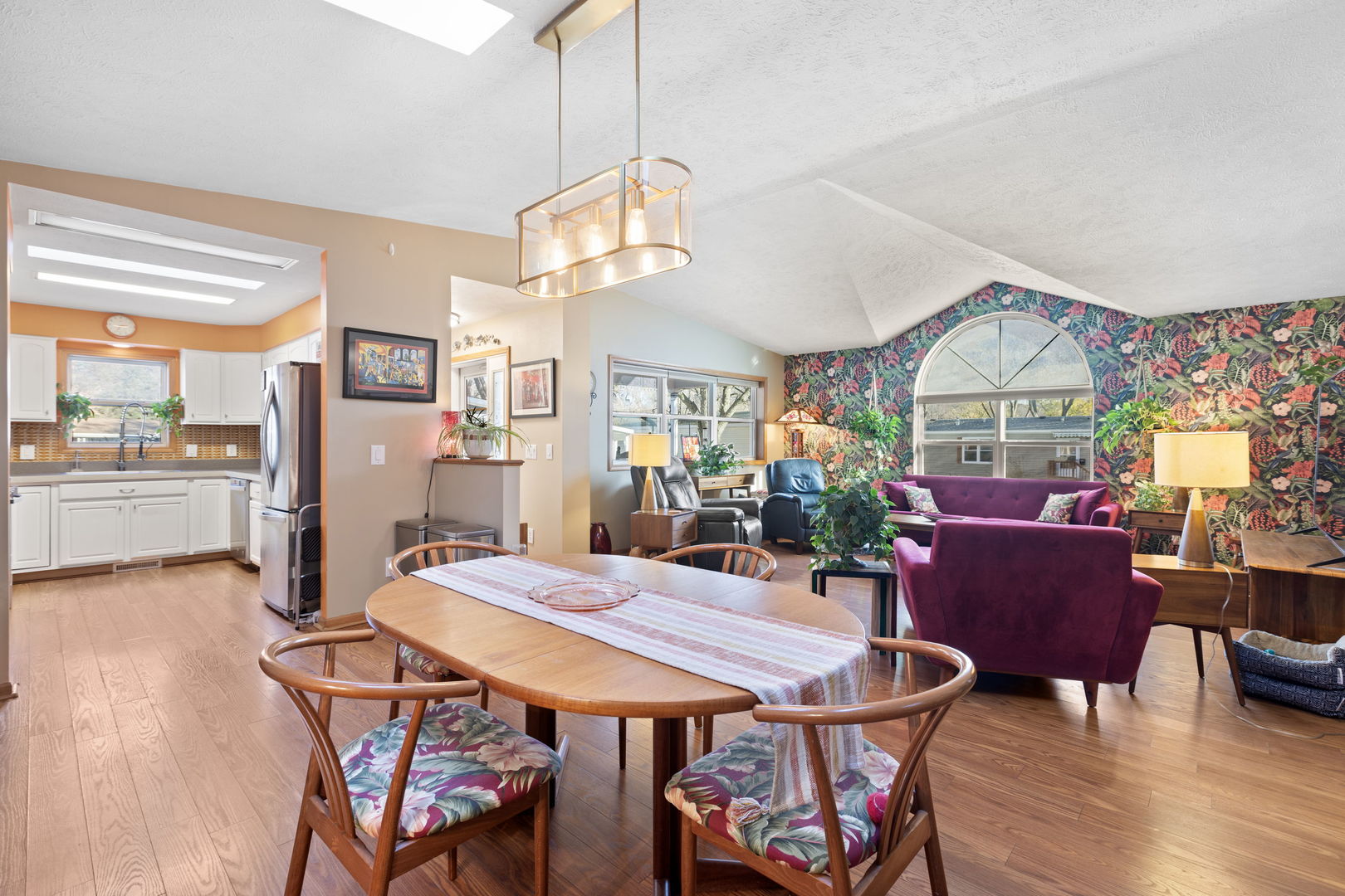1216 Candlewood Road Elgin, IL 60123 - Photo 10 of 24 a view of a dining room with furniture window and wooden floor