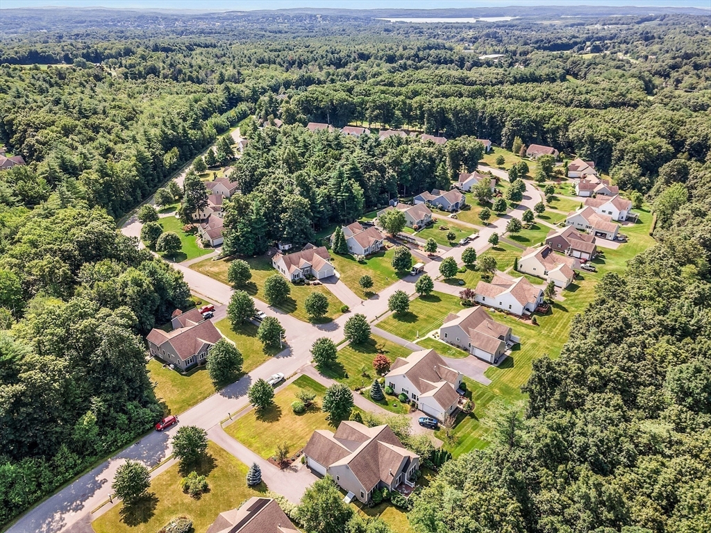124 Nicholas Drive Lancaster, MA 01523 - Photo 11 of 42 an aerial view of residential houses with outdoor space
